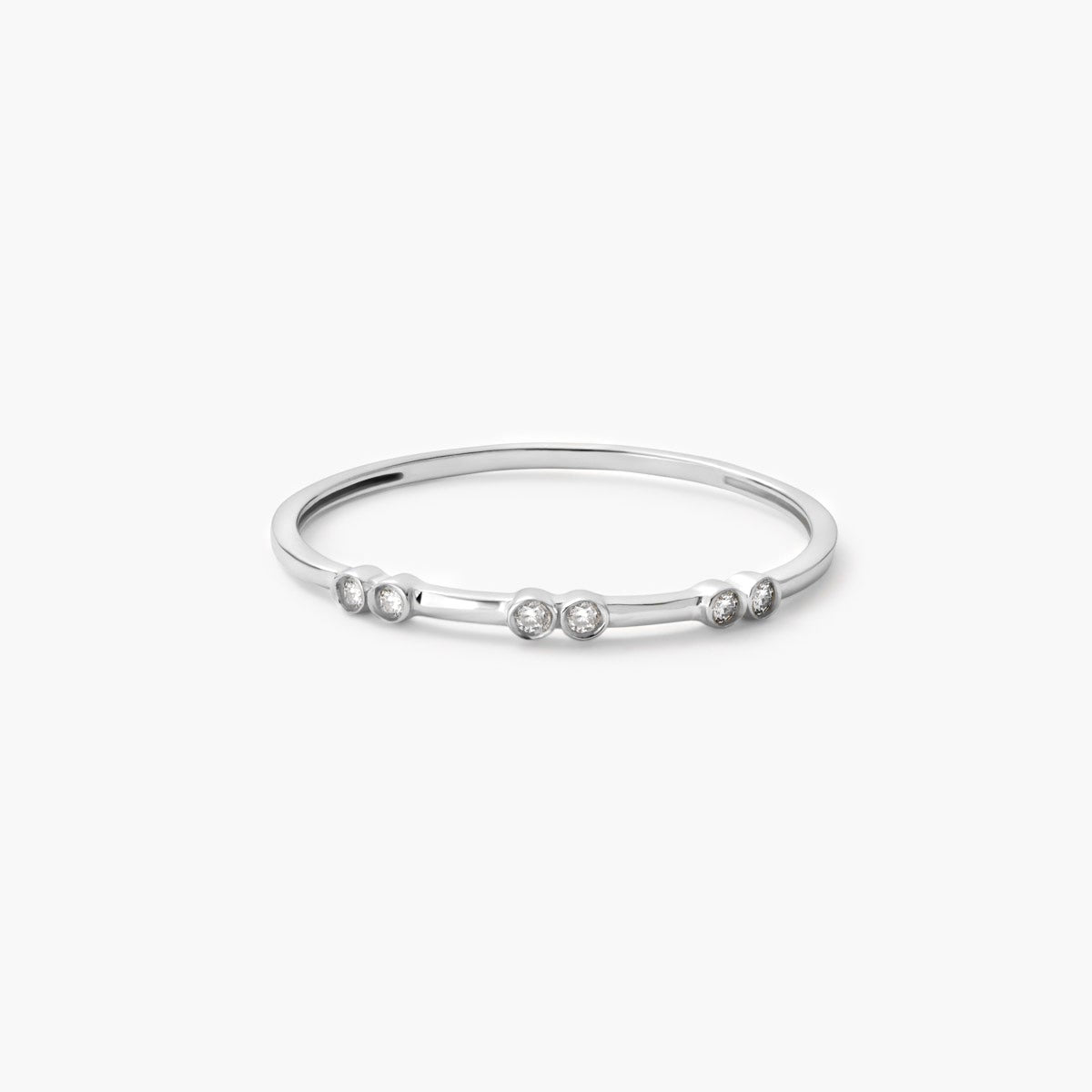 Anillo de oro blanco 18K diamante natural 0.04 ct.
