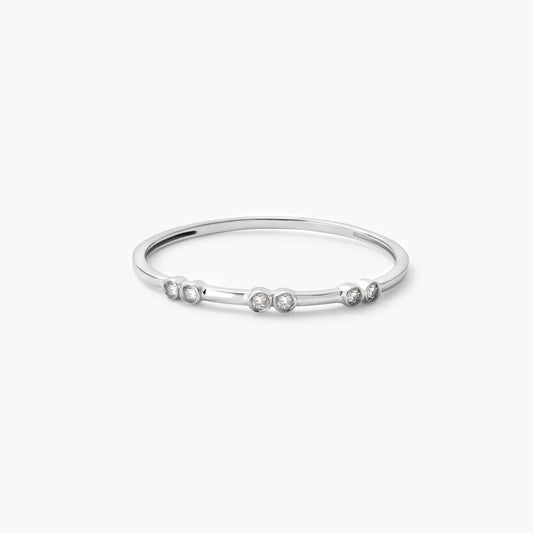 Anillo de oro blanco 18K diamante natural 0.04 ct.