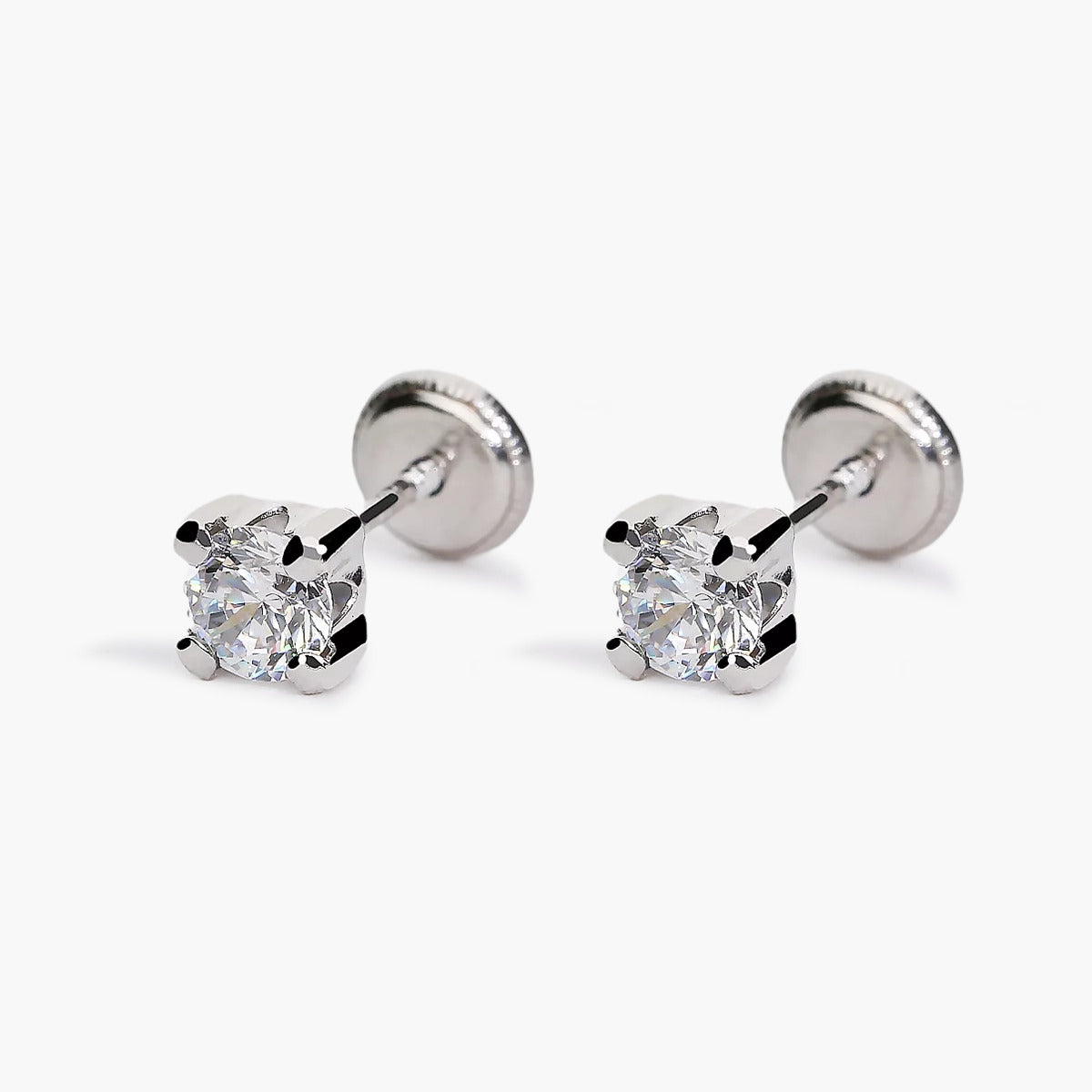 Pendientes redondos de oro blanco 18K circonita 4 mm