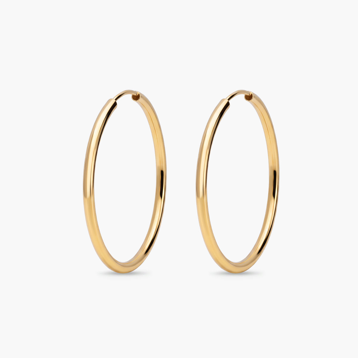 Pendientes de aro lisos de oro 18K 25 mm
