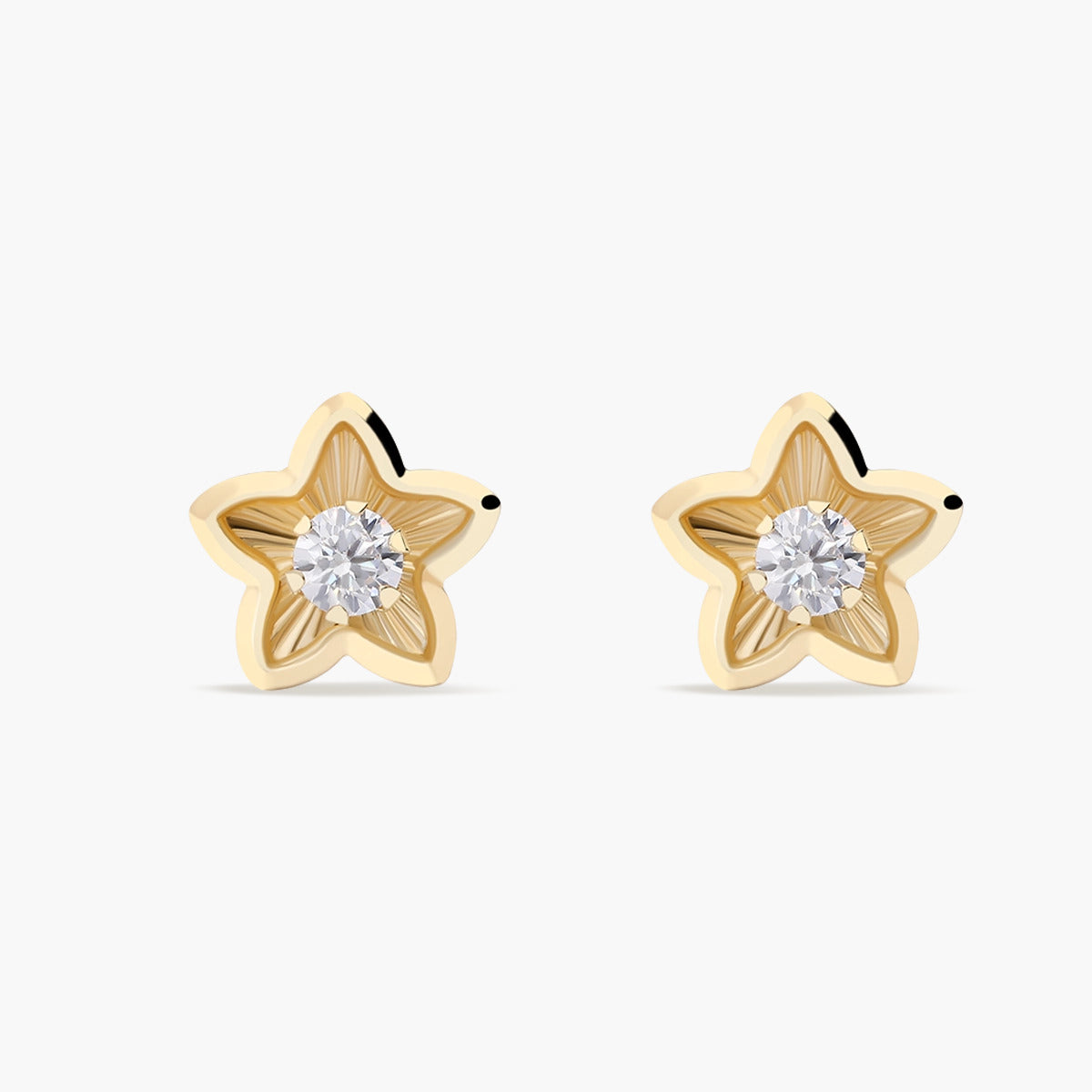 Pendientes estrella de oro 18K circonita 7 mm