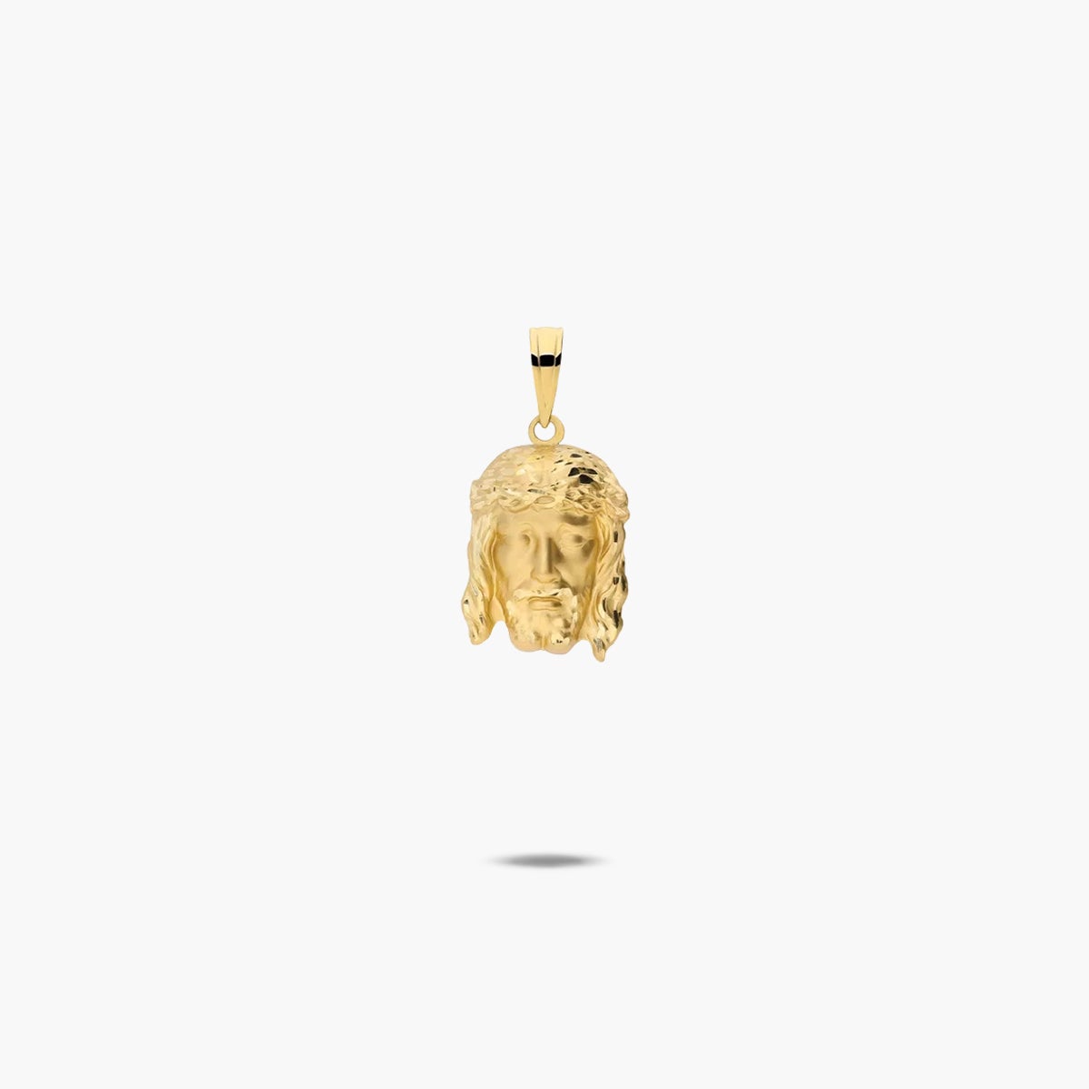 Colgante Cristo de oro 18K 16 mm