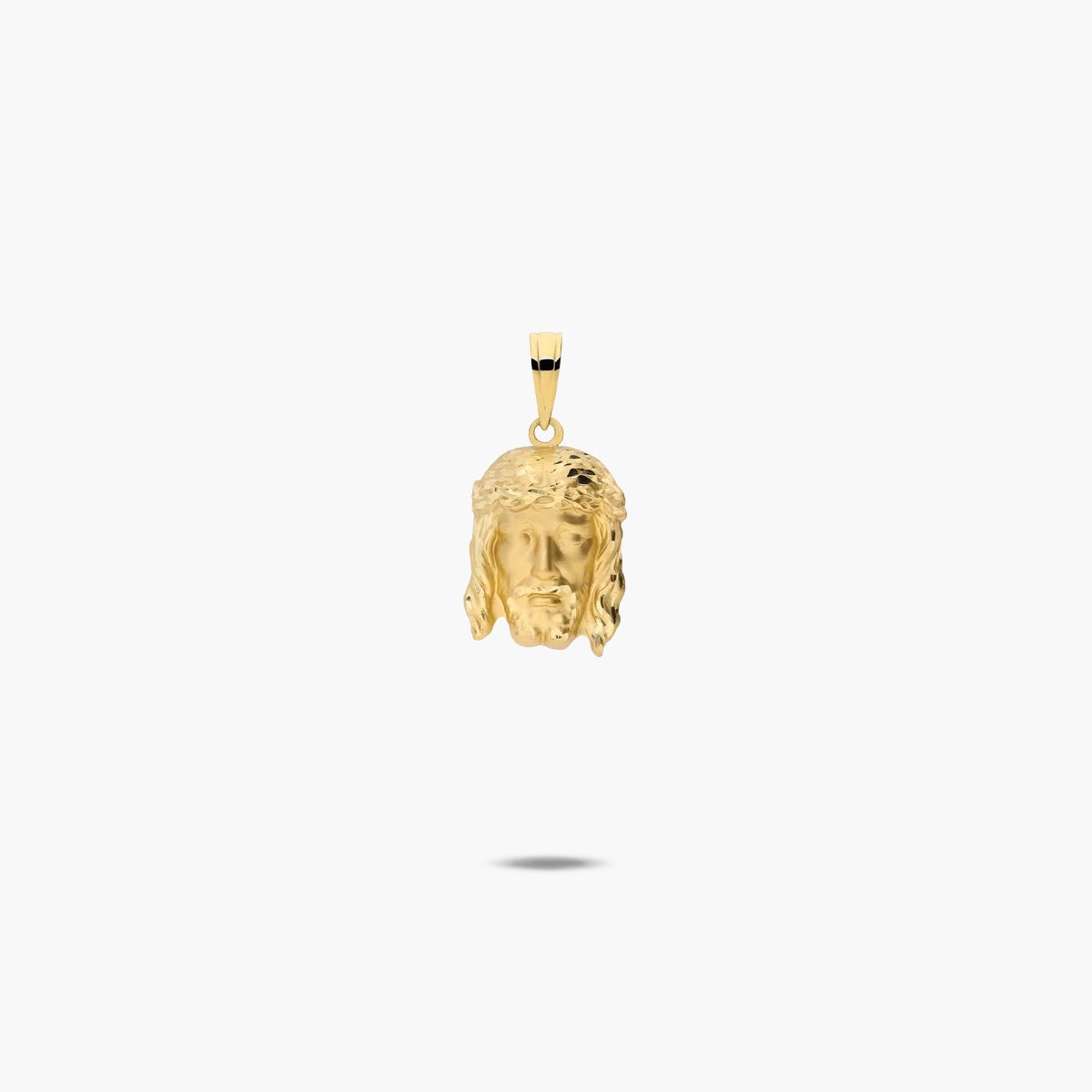 Colgante Cristo de oro 18K 16 mm