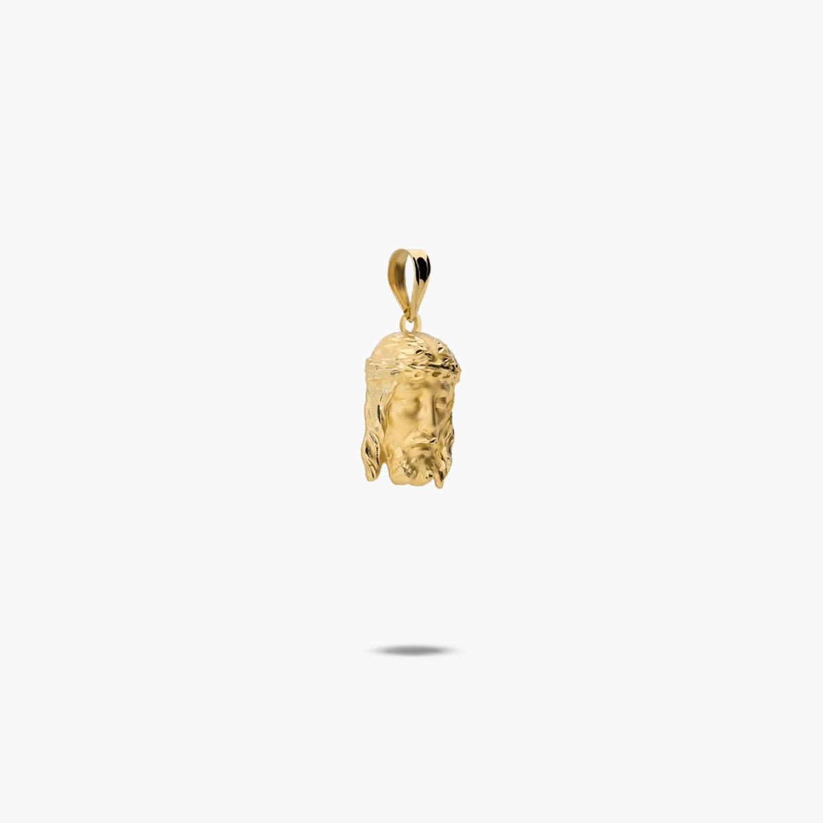 Colgante Cristo de oro 18K 16 mm