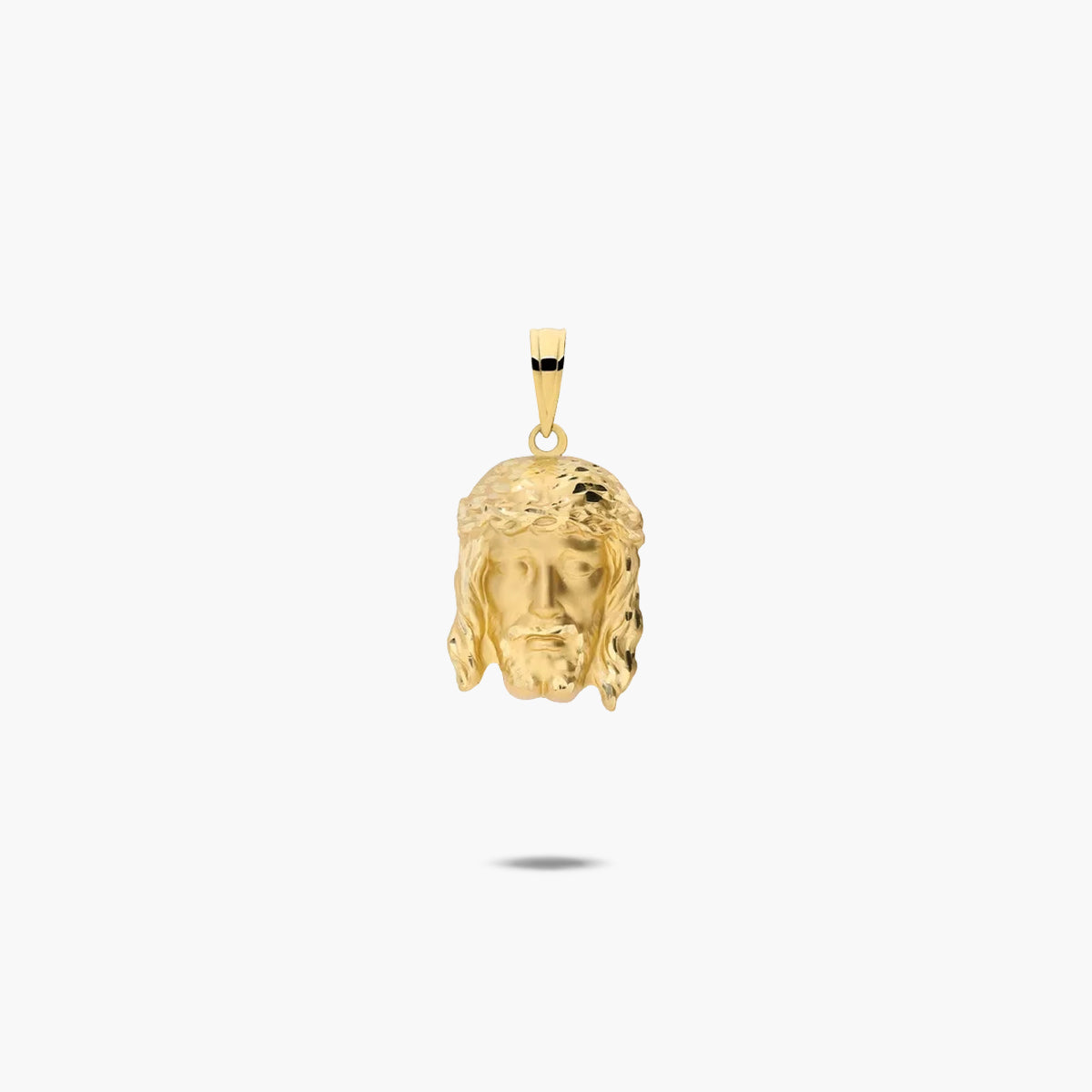 Colgante Cristo de oro 18K 20 mm