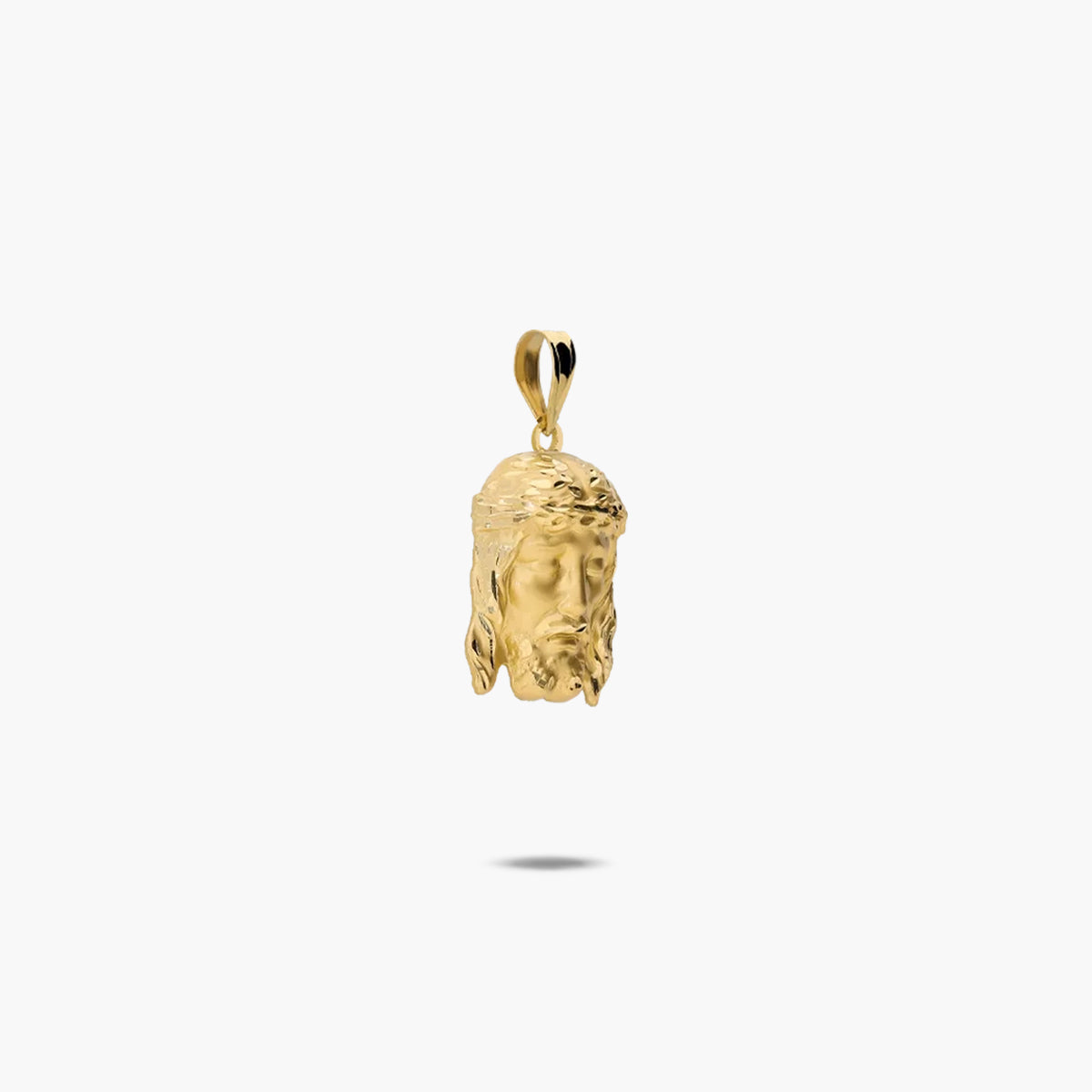 Colgante Cristo de oro 18K 20 mm