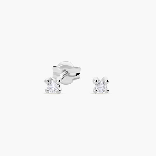 Pendientes redondos de oro blanco 18K diamante natural 0.10 ct. 2 mm