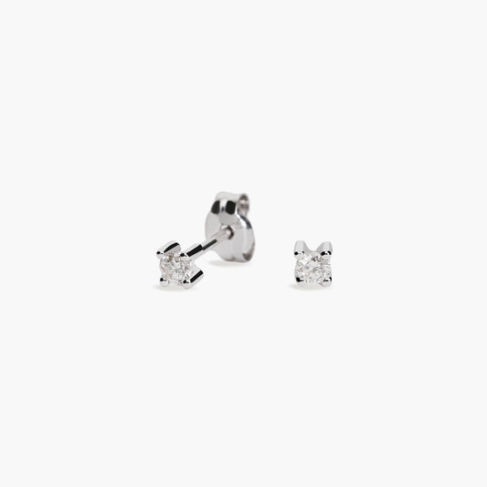 Pendientes redondos de oro blanco 18K diamante natural 0.14 ct. 2 mm