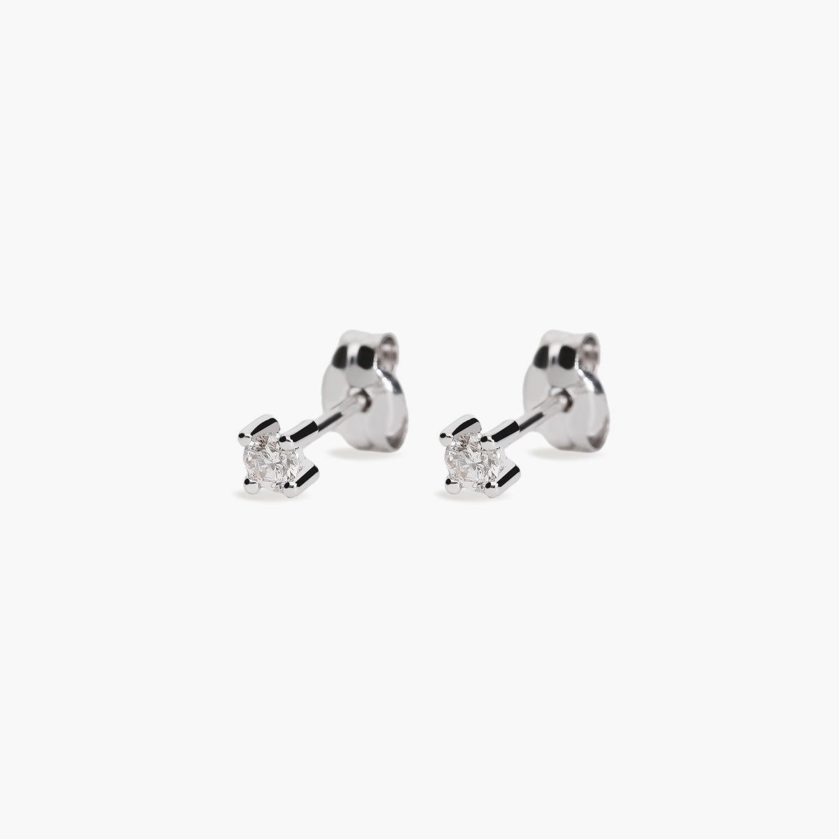 Pendientes redondos de oro blanco 18K diamante natural 0.14 ct. 2 mm