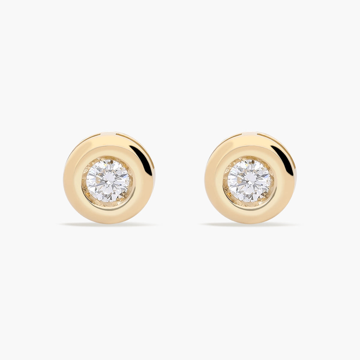 Pendientes redondos de oro 18K diamante natural 0.20 ct. 5 mm