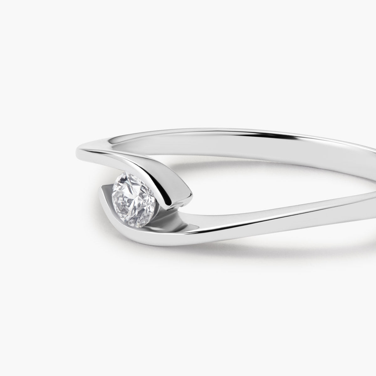 Anillo de oro blanco 18K diamante natural 0.12 ct. GRAVITY