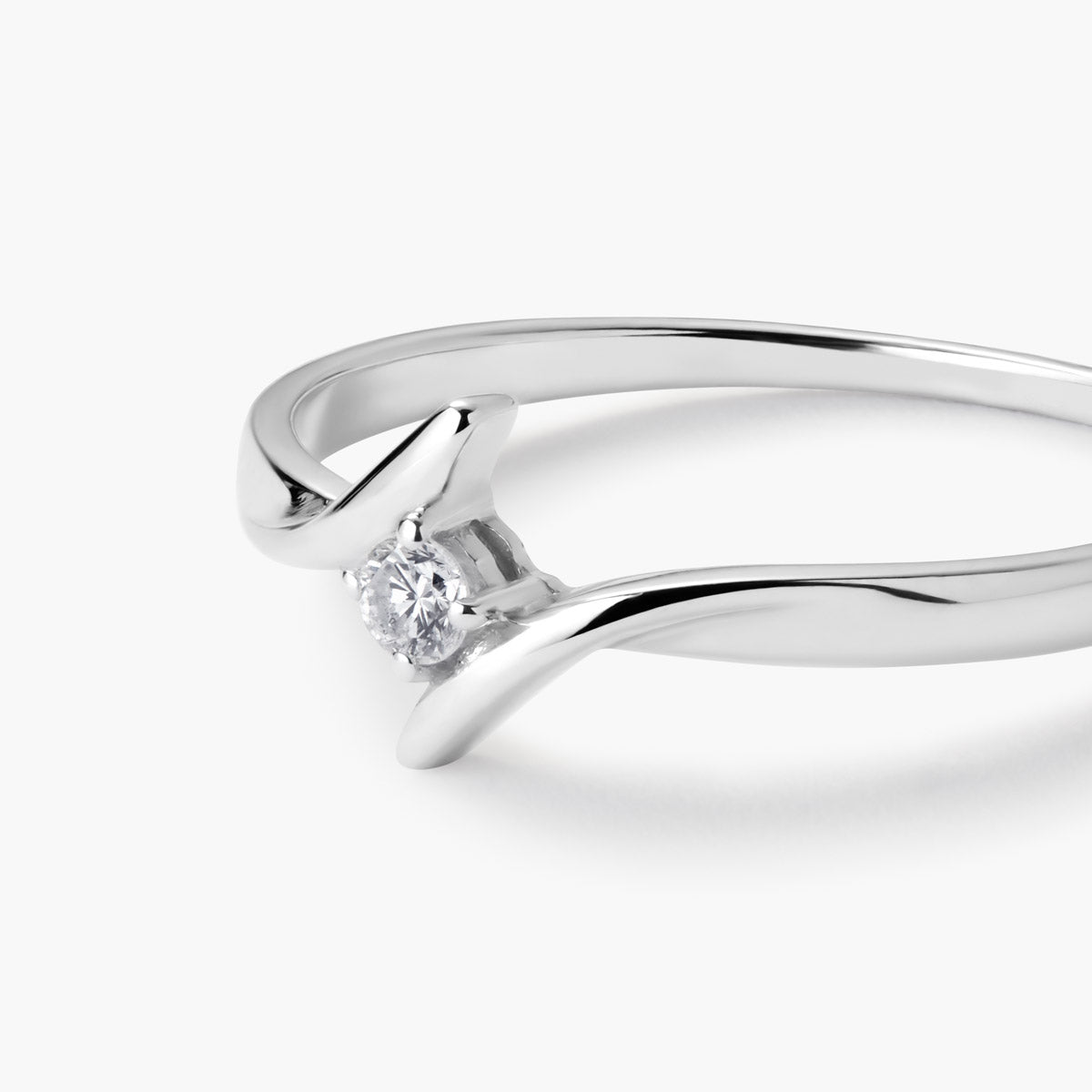 Anillo de oro blanco 18K diamante natural 0.05 ct. SWIRL