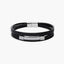 Pulsera cuero trenzado negro con chapa rectangular 21 cm