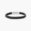 Pulsera de acero combinada con cuero negro trenzado 19-21 cm